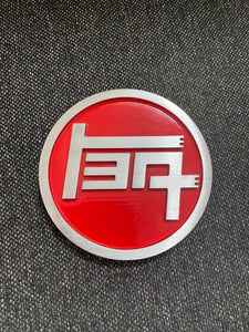 TEQ badge CNC machined