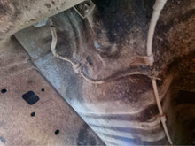 Chassis breather connection for fuel tank